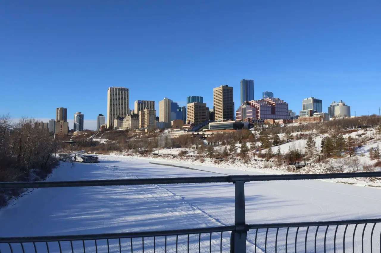 The Edmonton skyline above a snow-covered North Saskatchewan River valley